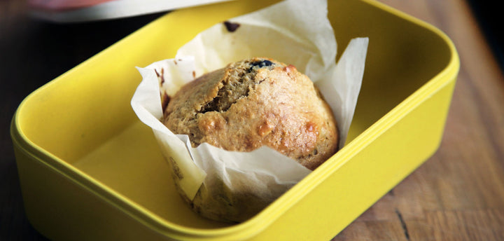Muffin in a yellow tin