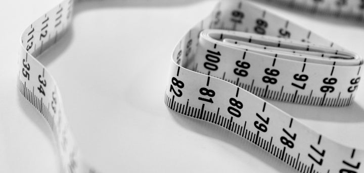 Selective focus photography of tape measure