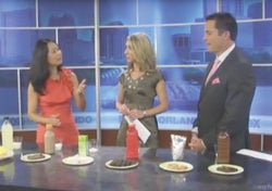 Dr. Julie Wei demonstrating how much sugar is in popular kids' drinks to two news anchors