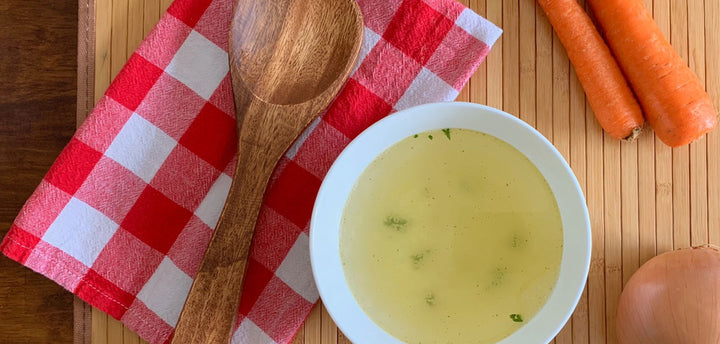 Broth in a white bowl