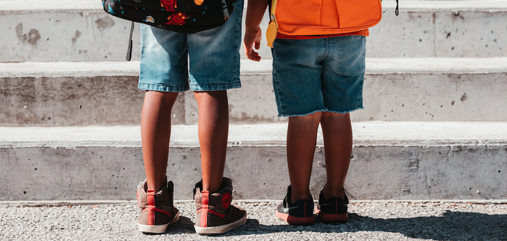 Children standing by stairs