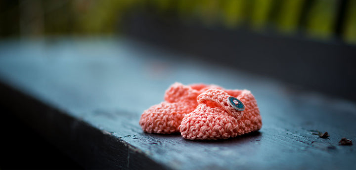 Pink baby booties