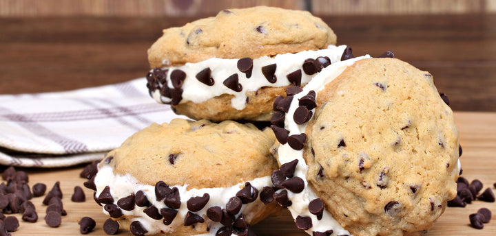 Three ice cream cookie sandwiches with chocolate chips