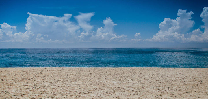Clouds, ocean and sand