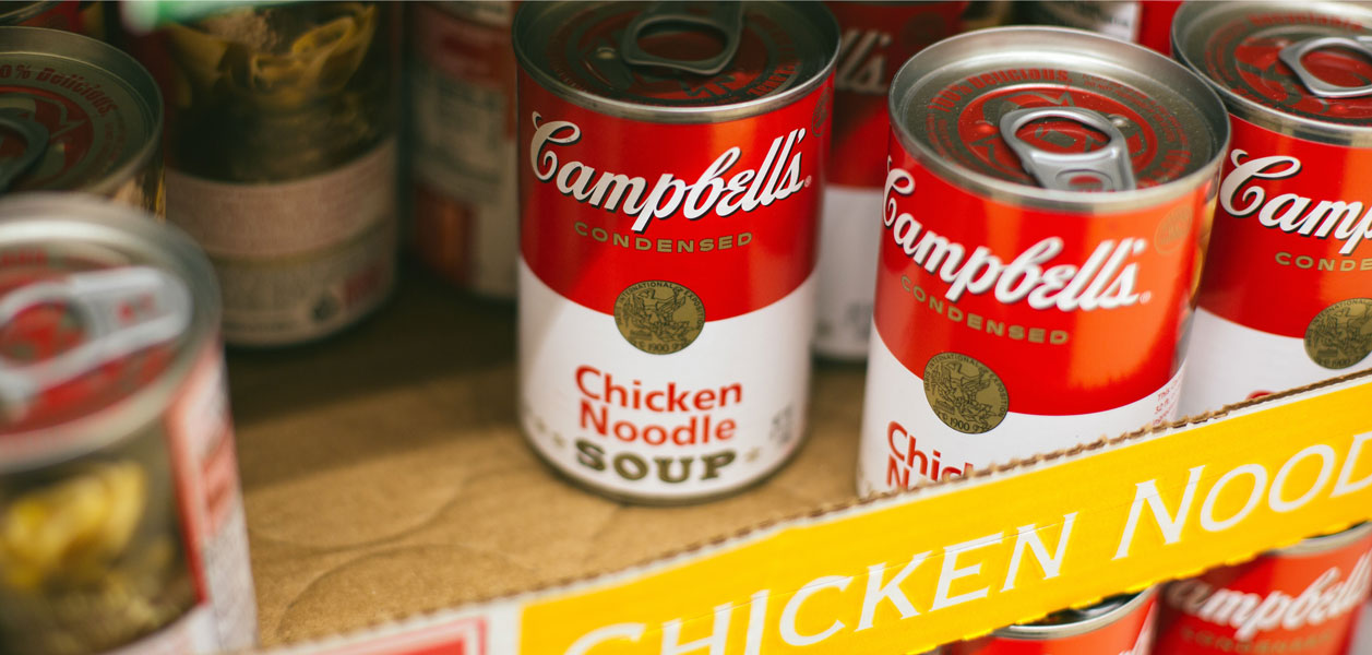 Campbell's Chicken Noodle Soup cans in a box